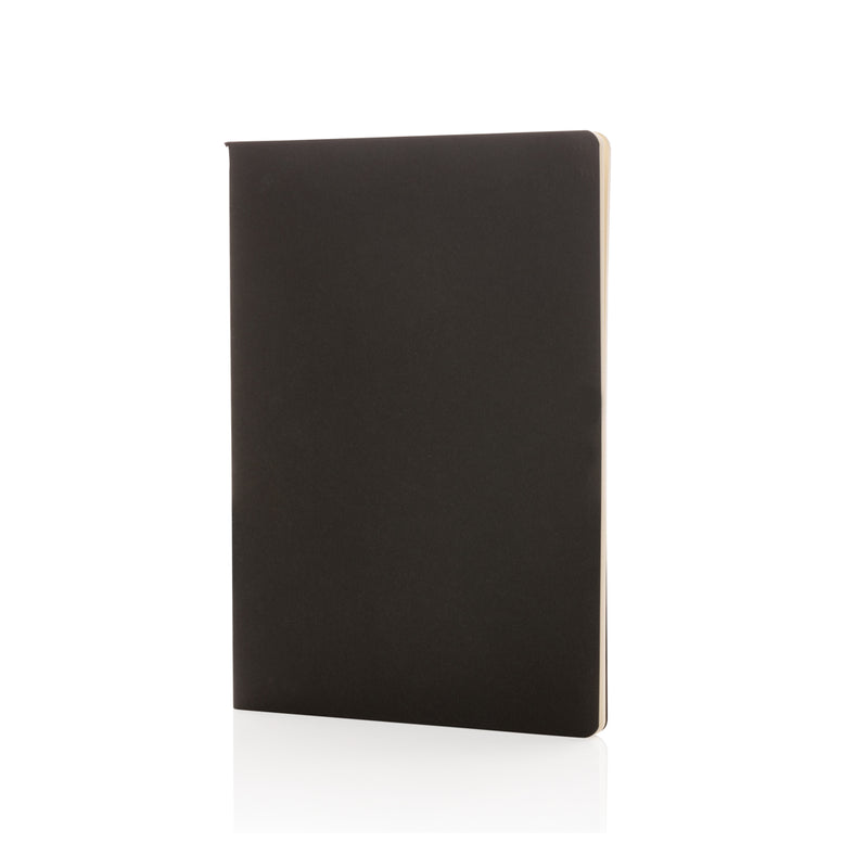 Load image into Gallery viewer, A5 softcover notebook from XD Collection with a smooth black cover, open to show lined pages inside.
