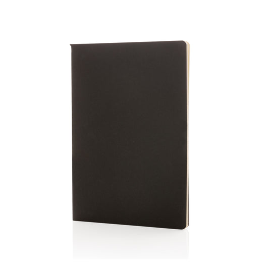 A5 softcover notebook from XD Collection with a smooth black cover, open to show lined pages inside.