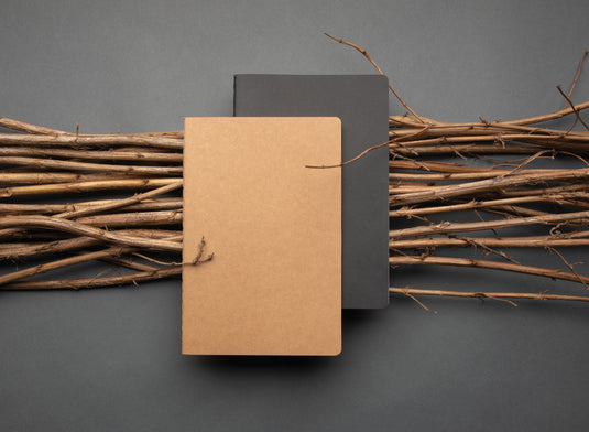 A5 softcover notebook from XD Collection with a minimalist design, open to show lined pages inside.