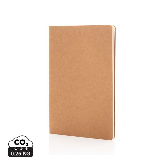 A5 softcover notebook from XD Collection with a smooth black cover and spiral binding, open to reveal lined pages.