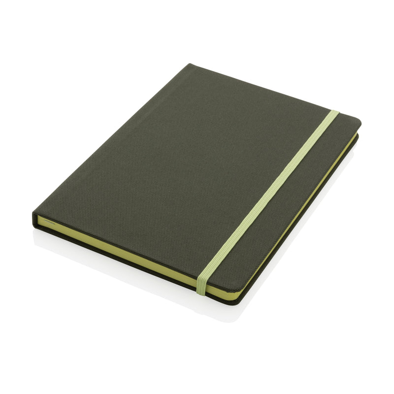 Load image into Gallery viewer, Blue GRS certified RPET A5 notebook from XD Collection with elastic closure and lined pages, suitable for note-taking and journaling.
