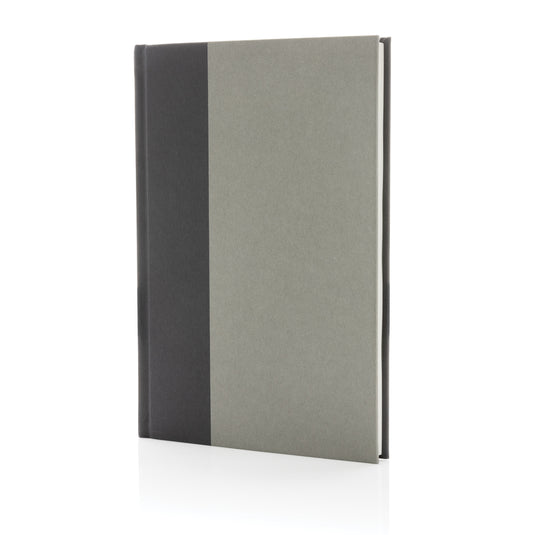 A Words GRS certified RPET and Kraft A5 notebook from XD Collection with a textured cover and elastic closure.