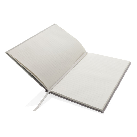 XD Collection Words GRS certified RPET and Kraft A5 notebook with a durable cover and lined pages for note-taking and journaling.