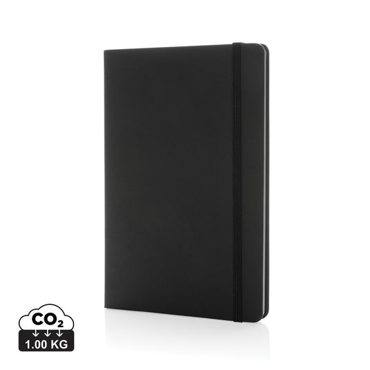 Craftstone A5 recycled kraft and stonepaper notebook from XD Collection, showing rustic cover and compact size.