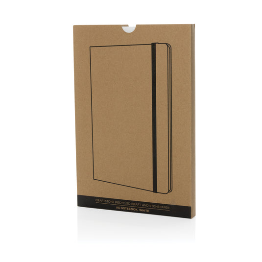 Craftstone A5 recycled kraft and stonepaper notebook from XD Collection, showing a textured cover and open pages inside.