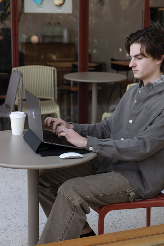 XD Design 14-inch mobile office sleeve showing sleek black fabric with zipper closure and padded interior for laptop protection.