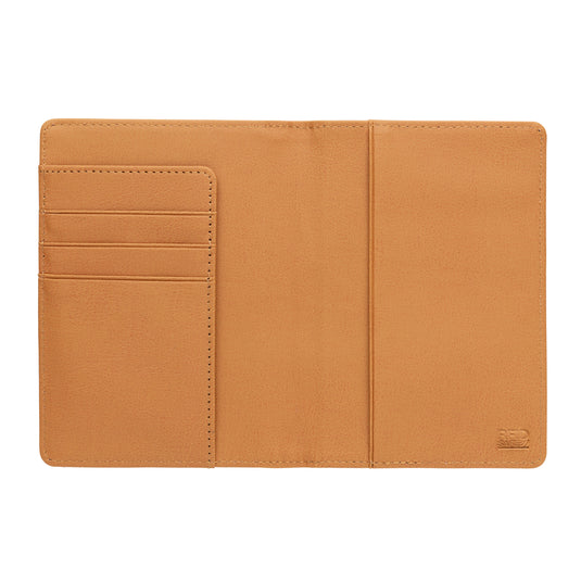 RFID passport cover from XD Collection made of cork, designed to protect travel documents with secure, stylish storage.