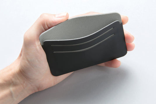 XD Xclusive Quebec RFID safe cardholder in black, compact travel bag with multiple card slots and secure RFID blocking features.