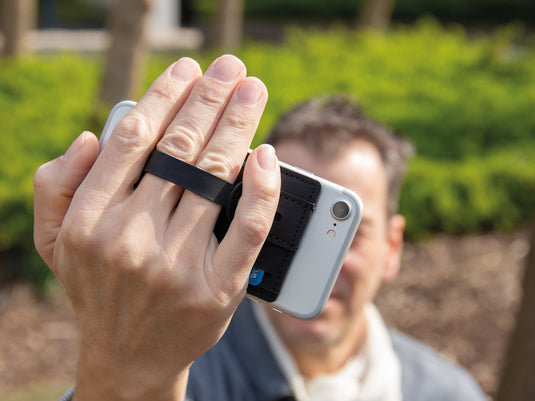 XD Collection 3-in-1 Phone and Tablet RFID Card Holder attached to a smartphone with multiple card slots and secure RFID protection.