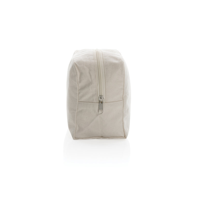 Load image into Gallery viewer, Undyed Impact Aware™ 285 gsm rcanvas toiletry bag from XD Collection, showing a natural, eco-friendly travel bag with a zipper closure.
