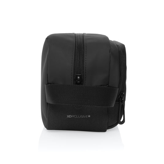 XD Xclusive Armond AWARE™ RPET toiletry bag with zipper closure, compact travel bag made from recycled materials, black color.