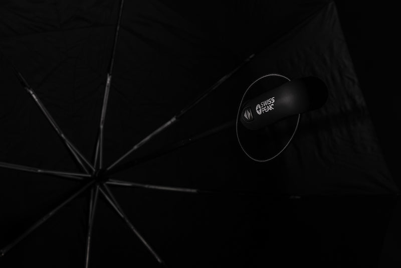 Load image into Gallery viewer, Swiss Peak Tornado 27-inch pocket storm umbrella open, showing sturdy canopy and compact design for travel and rain protection.
