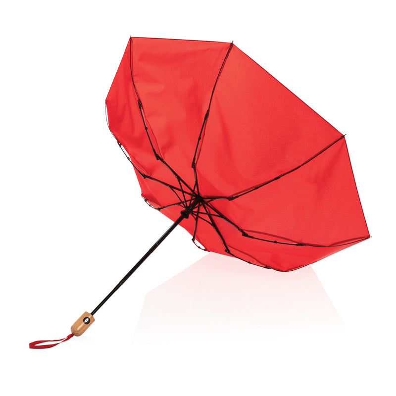 Load image into Gallery viewer, XD Collection 21-inch Impact AWARE™ RPET bamboo auto open/close umbrella with 190T fabric, showcasing its eco-friendly design and bamboo handle.
