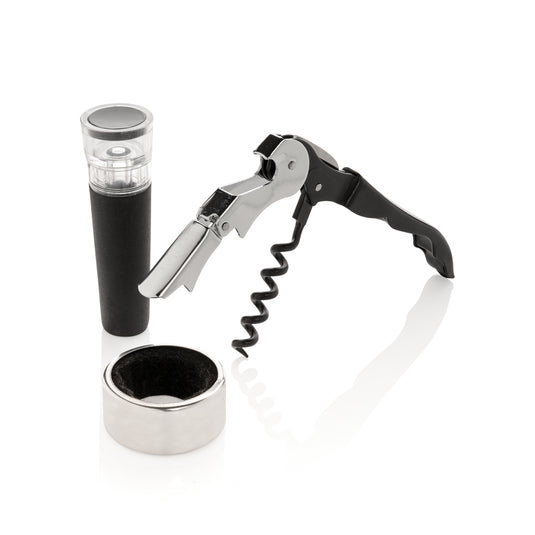 XD Collection Vino Sommelier set 3-piece for wine tasting includes corkscrew, foil cutter, and wine pourer on wooden surface.