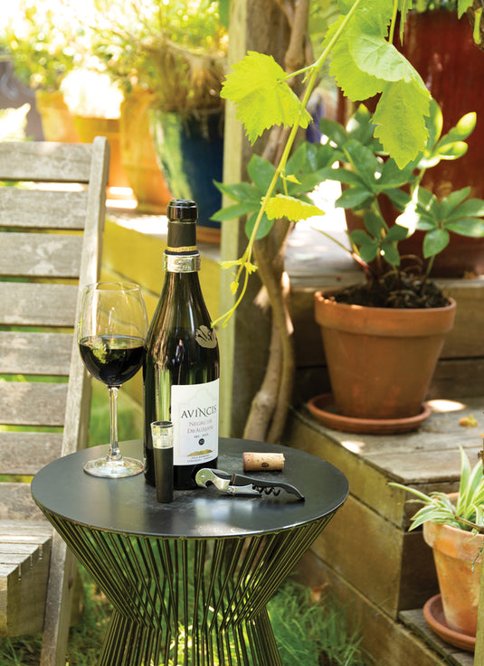 XD Collection Vino Sommelier 3-piece set with wine opener, foil cutter, and pourer displayed on a wooden table.