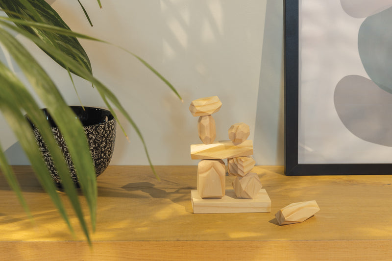 Load image into Gallery viewer, Ukiyo Crios wooden balancing rocks set in pouch, featuring natural wood stones for home décor and balancing play.
