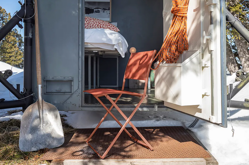 Load image into Gallery viewer, Fermob Plein Air folding chair with a sleek metal frame and fabric seat, perfect for outdoor relaxation and portable seating.
