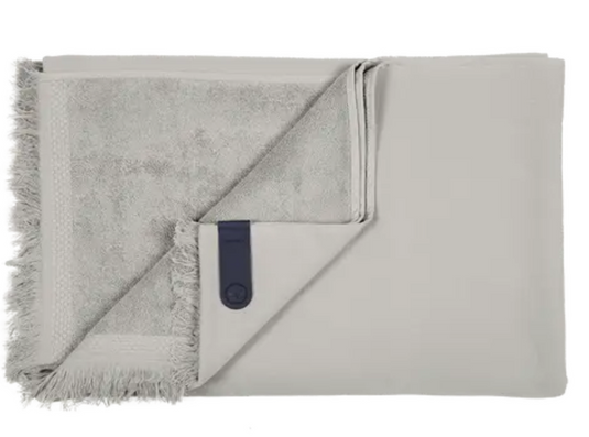 Fermob COLOR MIX Fouta towel in Pebble Grey, 200x100 cm with a vibrant multicolored pattern, made from soft, lightweight fabric.