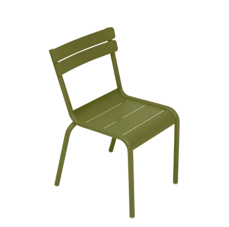 Load image into Gallery viewer, Fermob Luxembourg Kid Chair in Pesto color, child-sized restaurant furniture for kids' corner, modern and durable design.
