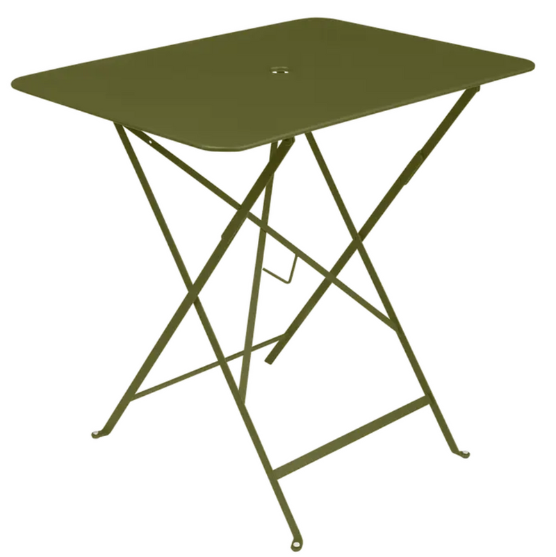 Load image into Gallery viewer, Fermob Pesto foldable bistro table, 77x57 cm, made of metal, shown outdoors with a sleek, modern design and foldable functionality.

