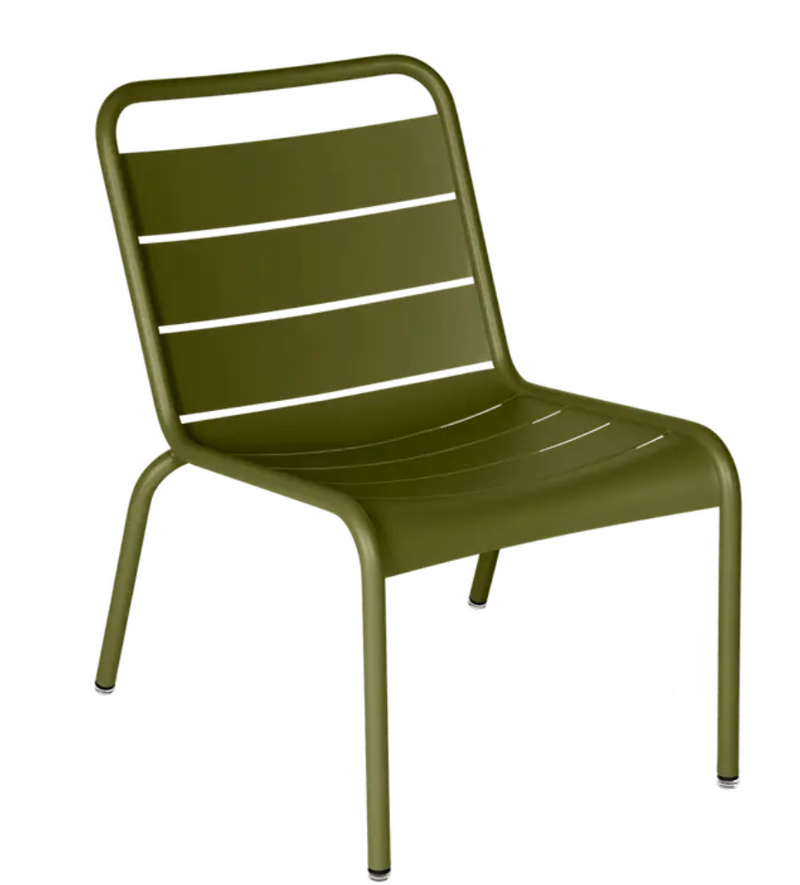 Load image into Gallery viewer, Fermob Luxembourg Lounge Chair with Pesto green metal frame for outdoor seating and modern patio decor.
