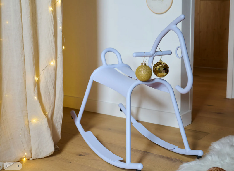 Load image into Gallery viewer, White ADADA rocking horse by Fermob, a kids' corner furniture piece, designed for restaurant waiting areas.
