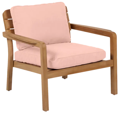 Fermob Lodge low armchair with teak frame and outdoor seating, shown on a hotel terrace setting.