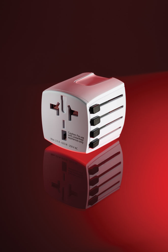 Load image into Gallery viewer, Skross SKROSS World Travel Adapter MUV Micro for phone and tablet charging, compact design, multiple plug types for international use.
