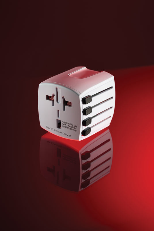 Skross SKROSS World Travel Adapter MUV Micro for phone and tablet charging, compact design, multiple plug types for international use.