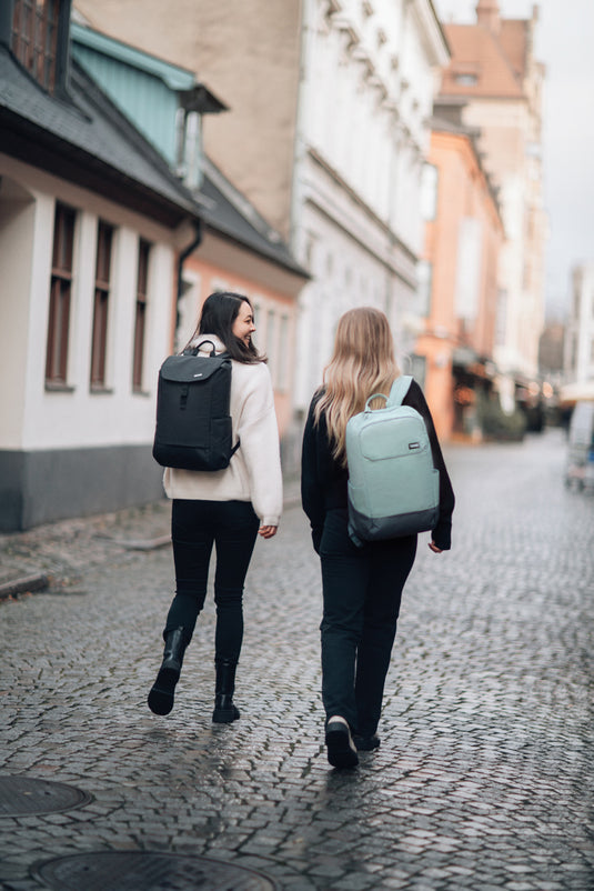 Thule Lithos Backpack 16L in black with multiple compartments, padded shoulder straps, and durable fabric for everyday travel.