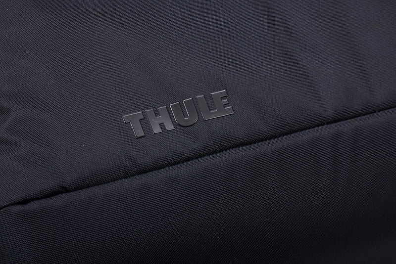 Load image into Gallery viewer, Thule Subterra 2 Duffel 35L in black, showing the durable fabric, shoulder strap, and spacious main compartment for travel and storage.
