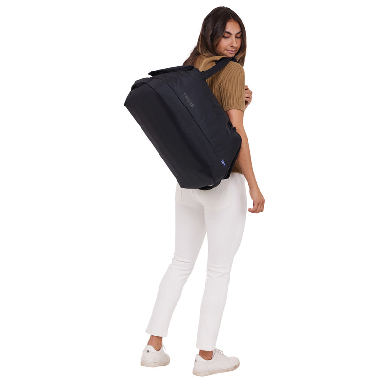 Load image into Gallery viewer, Thule Subterra 2 Duffel Bag 35L in black, with durable fabric and zippered compartments for travel and storage.
