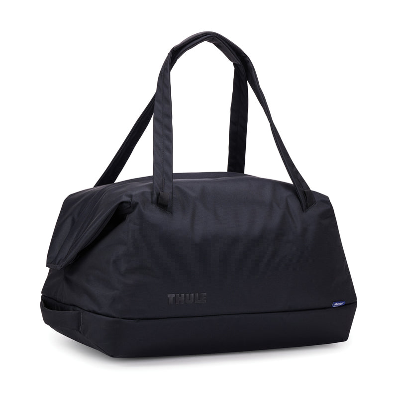 Load image into Gallery viewer, Thule Subterra 2 35L duffel bag shown with black fabric, sturdy handles, and a compact travel design for convenient packing.
