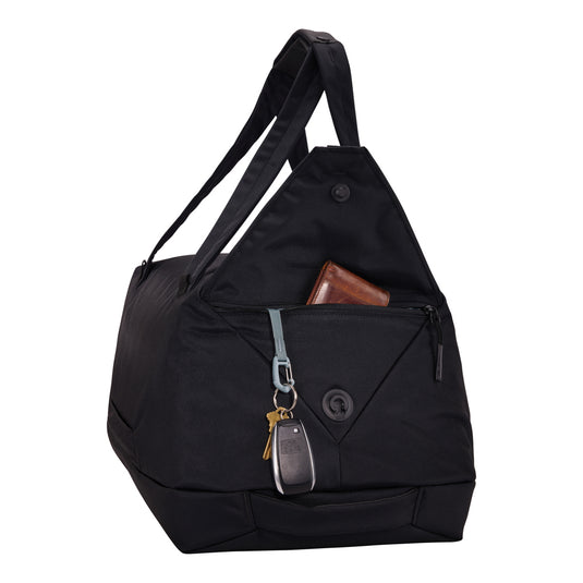Thule Subterra 2 35L duffel bag in black with carry handles and adjustable shoulder strap, suitable for travel and gym use.