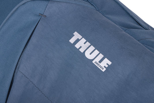 Thule Indago 23L backpack in black with multiple compartments, designed for travel and outdoor use.