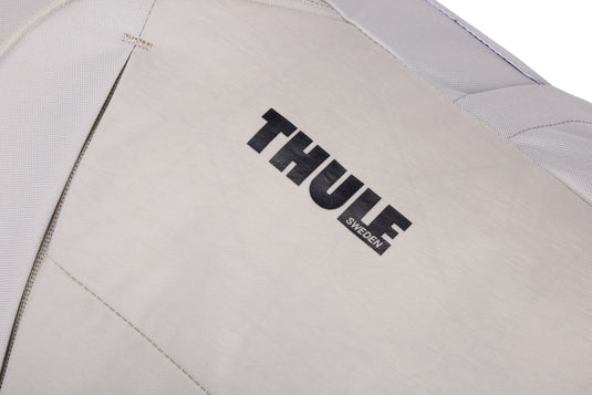 Thule Indago 23L backpack in black with multiple compartments for travel and daily use, featuring padded shoulder straps.