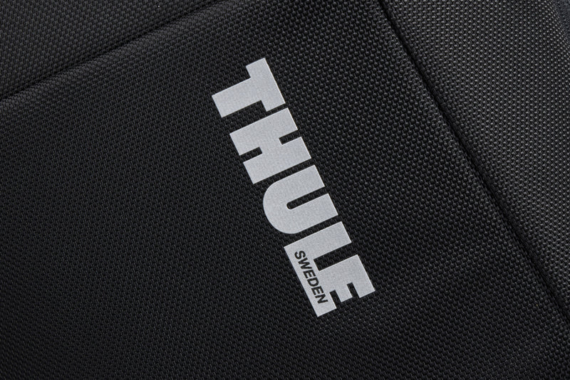 Load image into Gallery viewer, Thule Accent Recycled Backpack 23L in black with multiple compartments and padded straps, designed for comfortable everyday carry.
