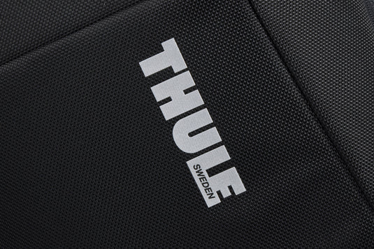 Thule Accent Recycled Backpack 23L in black with multiple compartments and padded straps, designed for comfortable everyday carry.