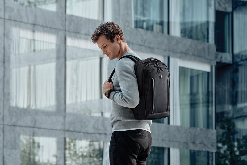 Load image into Gallery viewer, Victorinox Altmont Professional compact laptop backpack with 15.6-inch compartment and multiple storage pockets, black nylon material.
