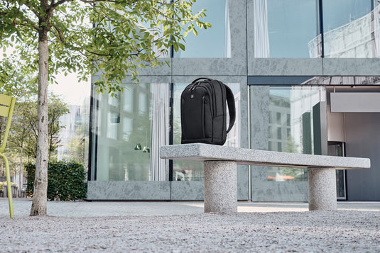Victorinox Altmont Professional compact laptop backpack with padded compartments and multiple zippered pockets, black nylon material.