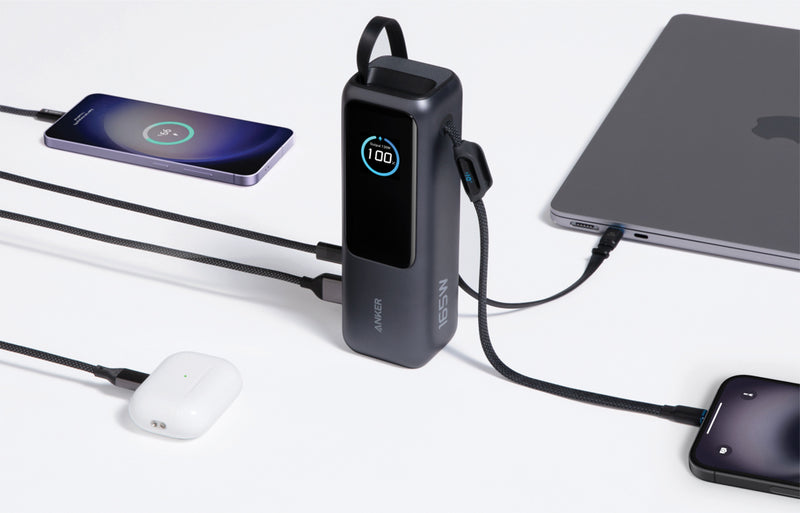 Load image into Gallery viewer, Anker Power Bank 25,000mAh with 165W output, built-in retractable cable for phone and tablet charging.
