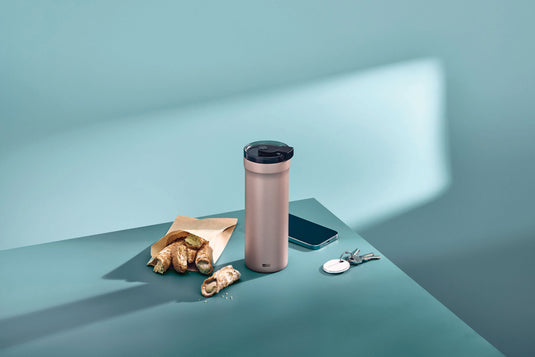 AdHoc Thermal Mug Pulse in stainless steel with black lid, designed for hot beverages, featuring a sleek, modern home and living style.
