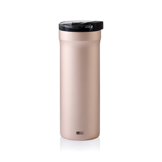 AdHoc Thermal Mug Pulse in stainless steel with black handle, designed for hot and cold beverages, in a modern home and living setting.