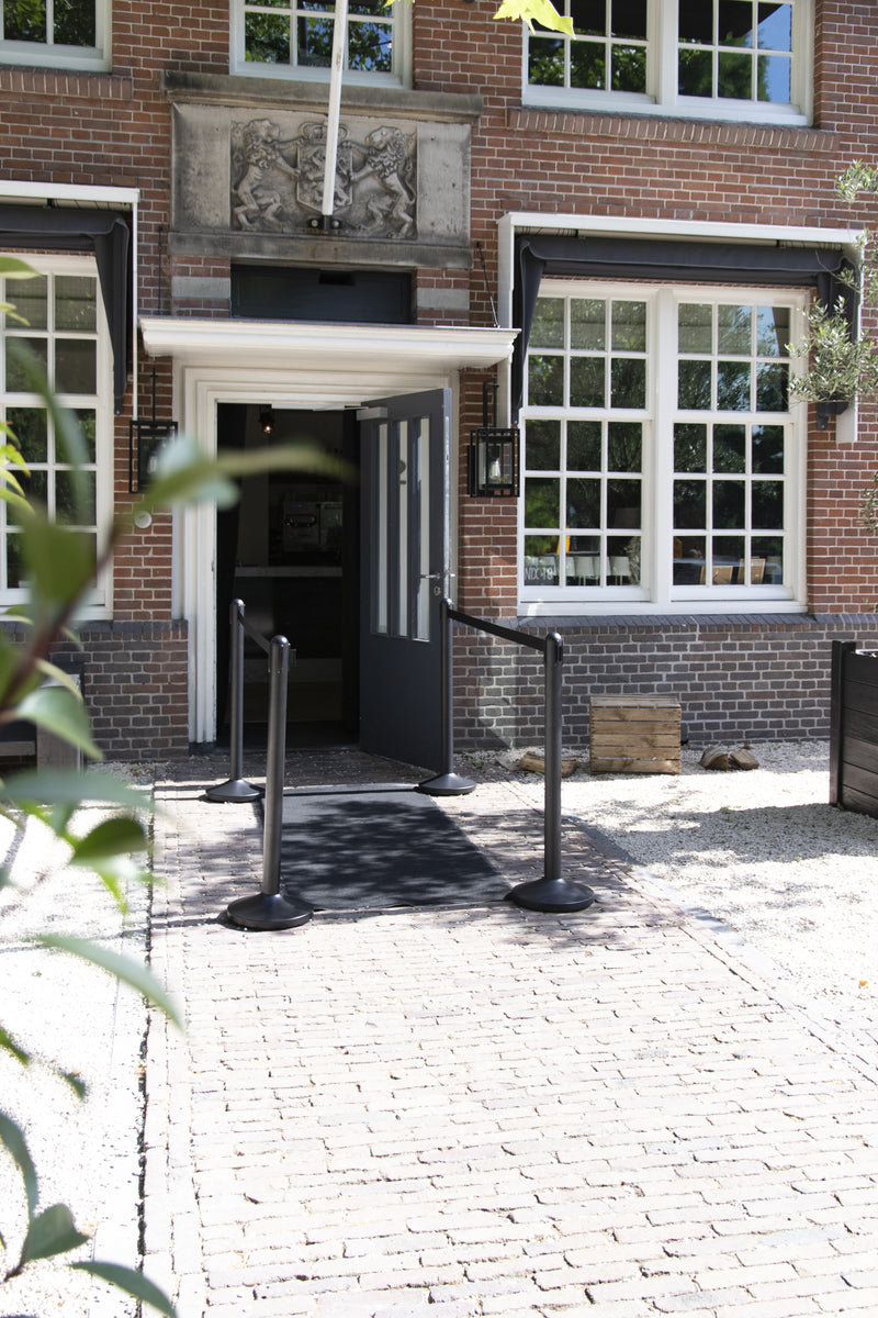 Load image into Gallery viewer, Securit Barriers Systems - Retractable - Coated black 88x31x31cm - in use
