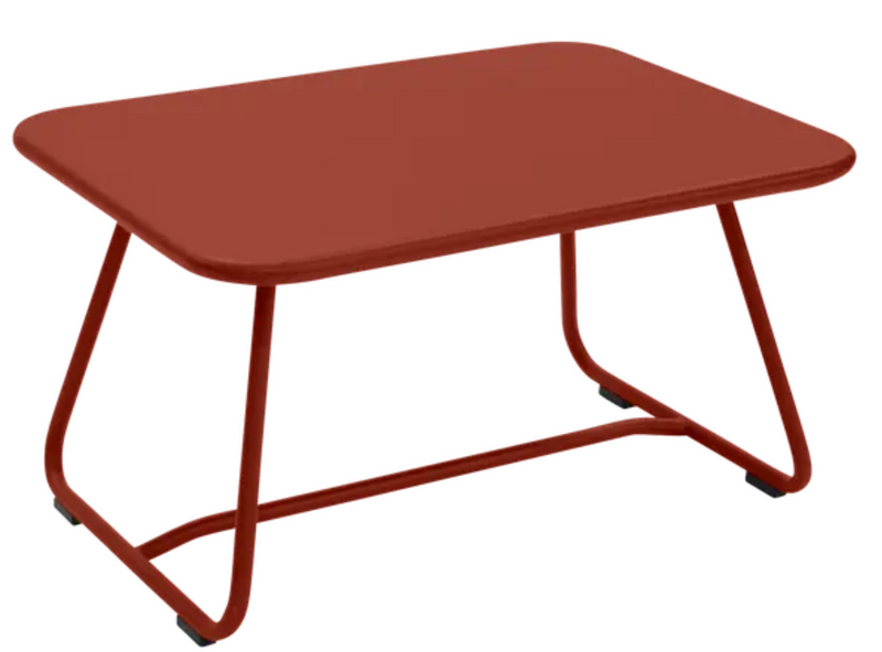 Load image into Gallery viewer, Red Fermob Sixties low outdoor table with a 76 x 55.5cm surface, stylish and durable for outdoor patio or garden use.
