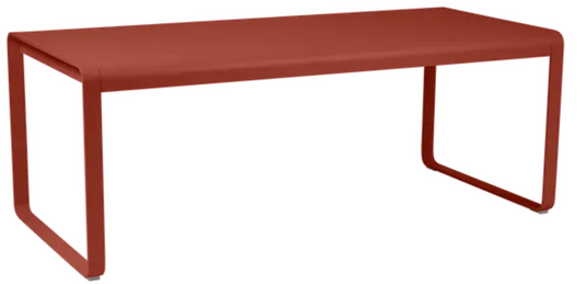 Red Ochre Fermob Bellevie outdoor metal dining table, 196 x 90 cm, eight-seater, suitable for outdoor patio or garden use.