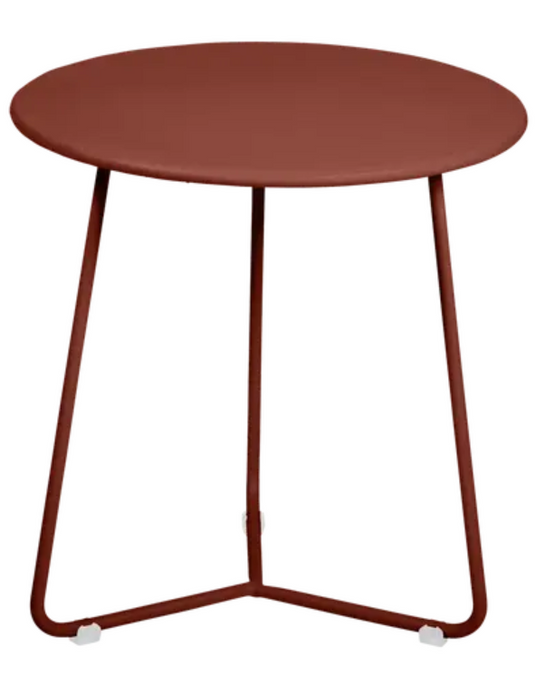 Red Fermob small occasional table with round top, 34cm diameter, ideal for living room or patio decor.