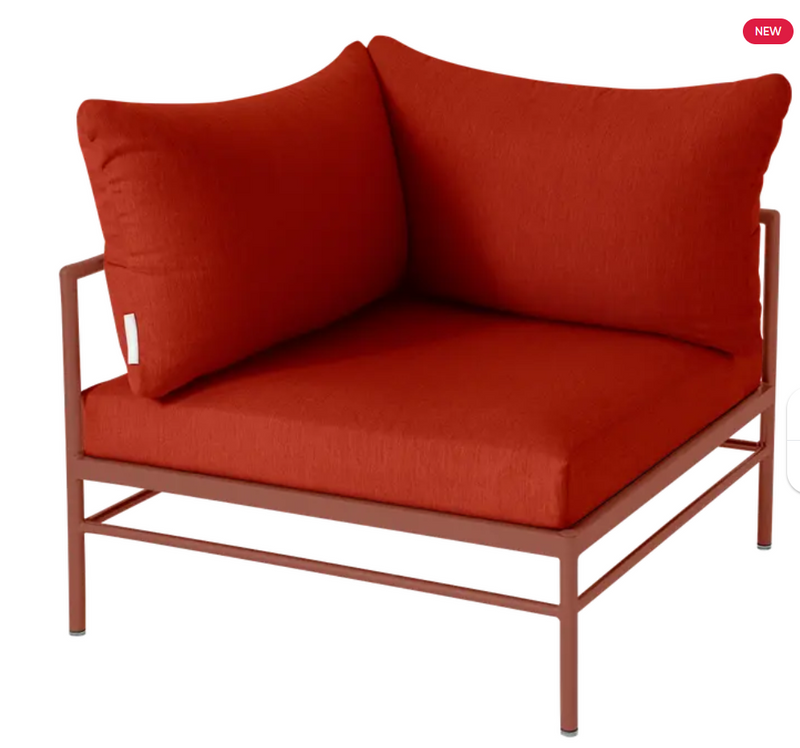 Load image into Gallery viewer, Red ochre Fermob Rivage corner outdoor armchair with metal frame and wicker accents, designed for stylish outdoor seating.
