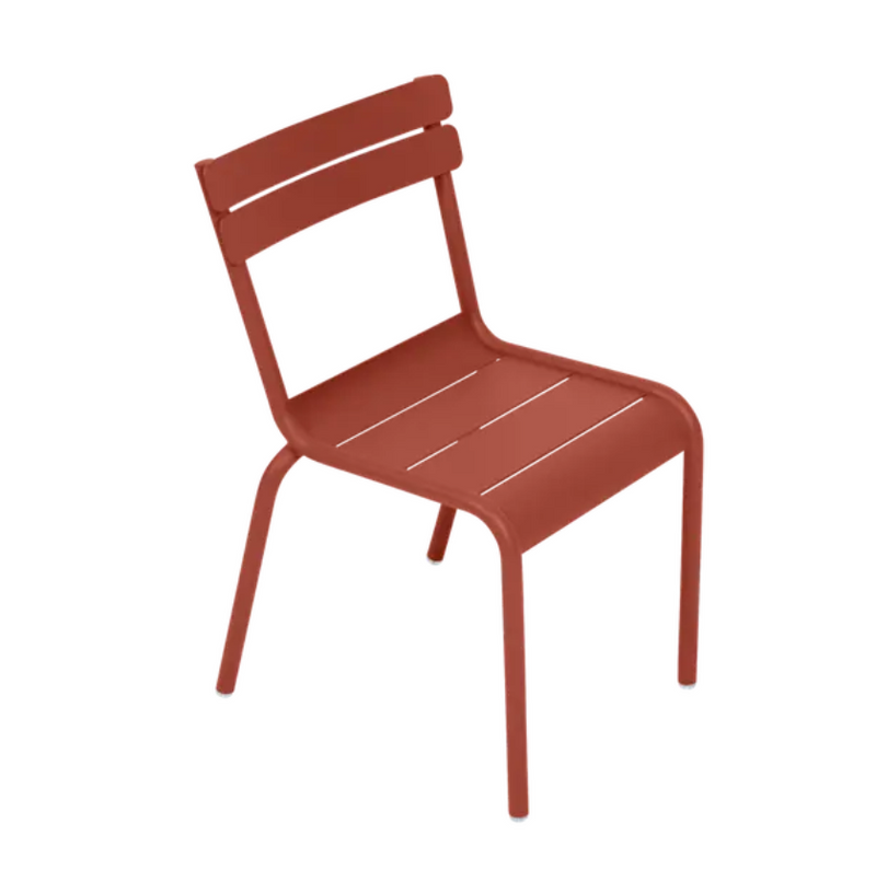 Load image into Gallery viewer, Red ochre Fermob Luxembourg Kid Chair from Fermb Kids Corner Contract, designed for children’s restaurant or corner furniture.
