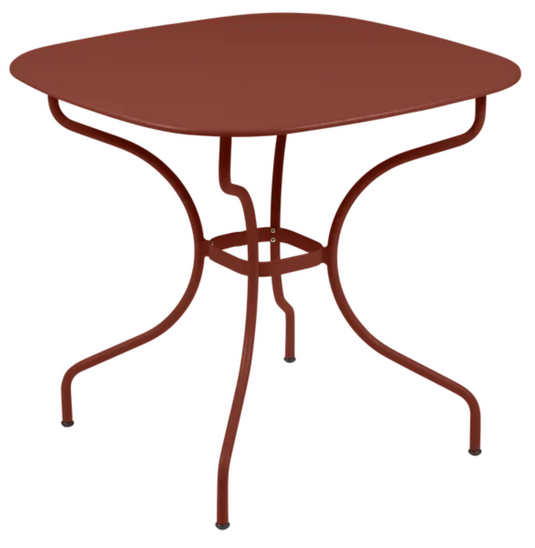 Red Ochre Fermob OPÉRA+ Carronde outdoor metal table, 82x82 cm, ideal for garden or patio dining and outdoor spaces.